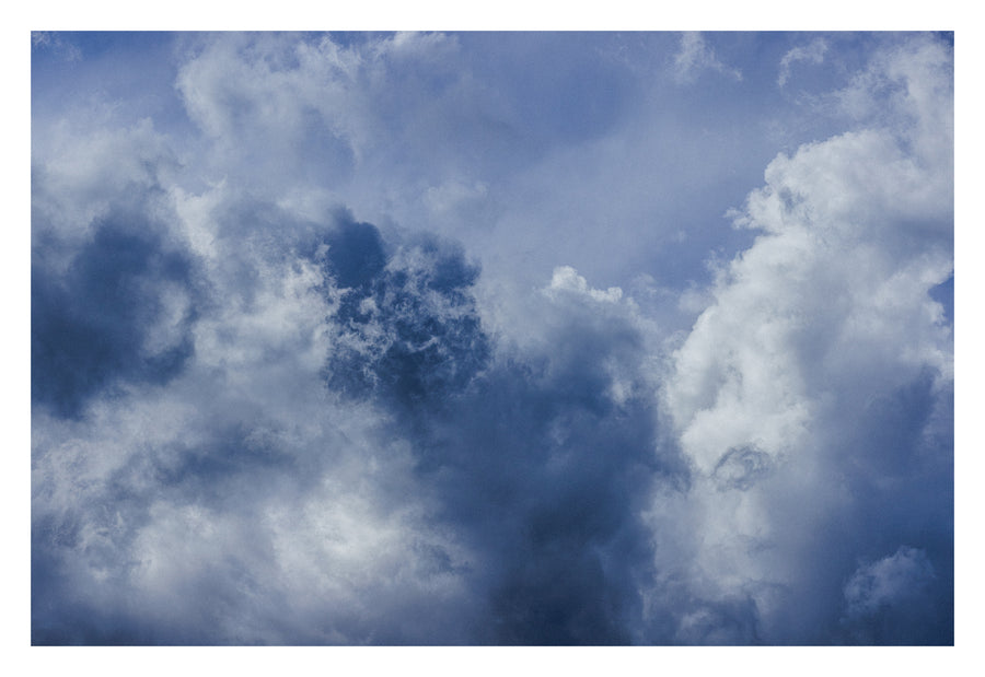 An Alberta sky held between two infinities. Shown with the white signing border.