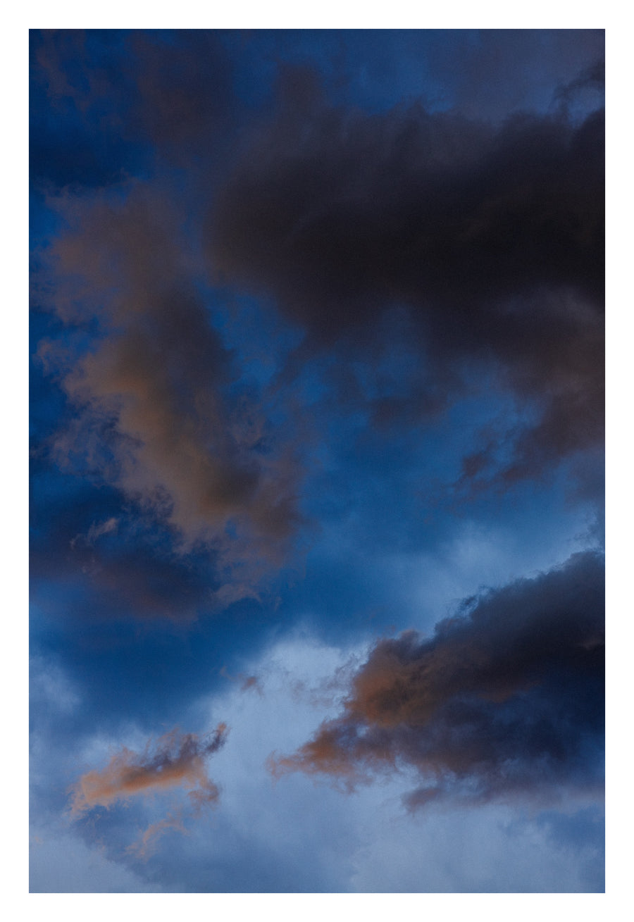 An Alberta sky in the breath before the weather exhales. Shown with the white signing border.