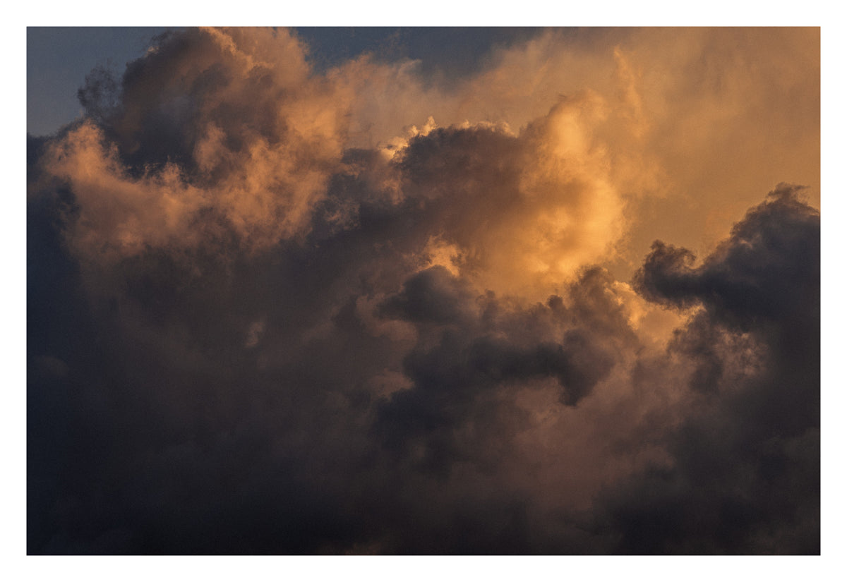 An Alberta cloud poised in anticipation. Shown with the white signing border.