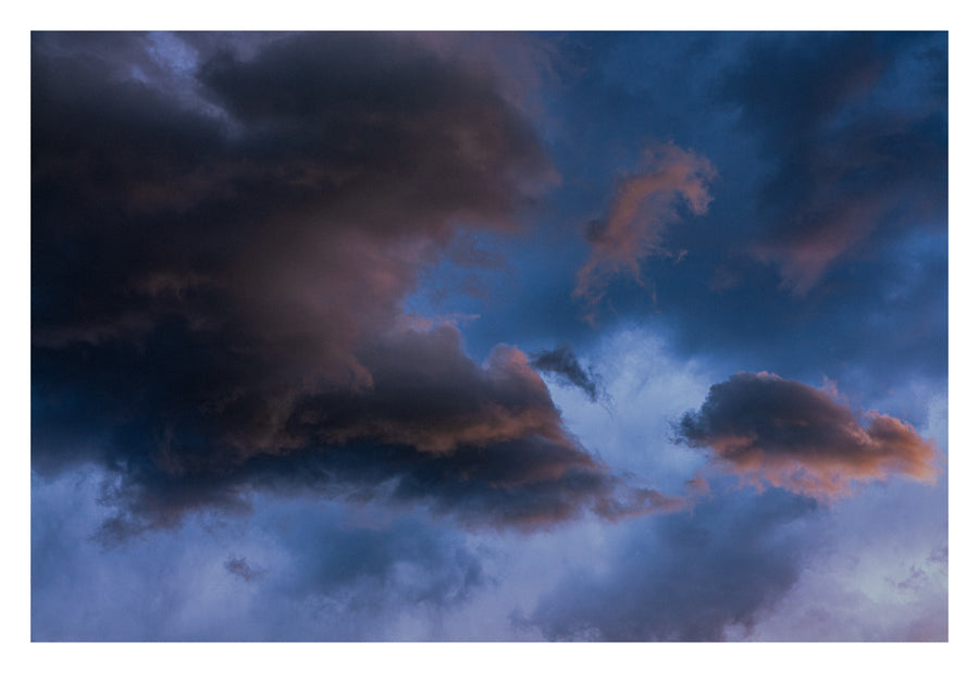 Light breaking as revelation through an Alberta cloud. Shown with the white signing border.