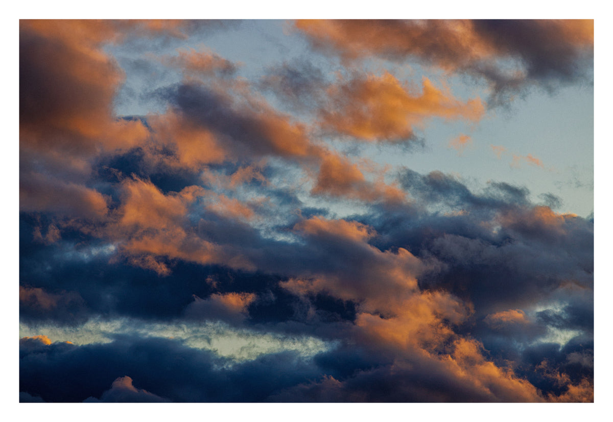 An Alberta cloud in the moment before everything changes. Shown with the white signing border.