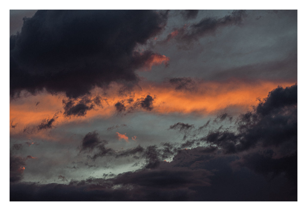 Sand-toned Alberta cloud, ancient and indifferent. Shown with the white signing border.