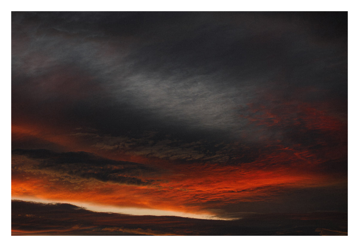 An Alberta horizon where cloud becomes landscape. Shown with the white signing border.