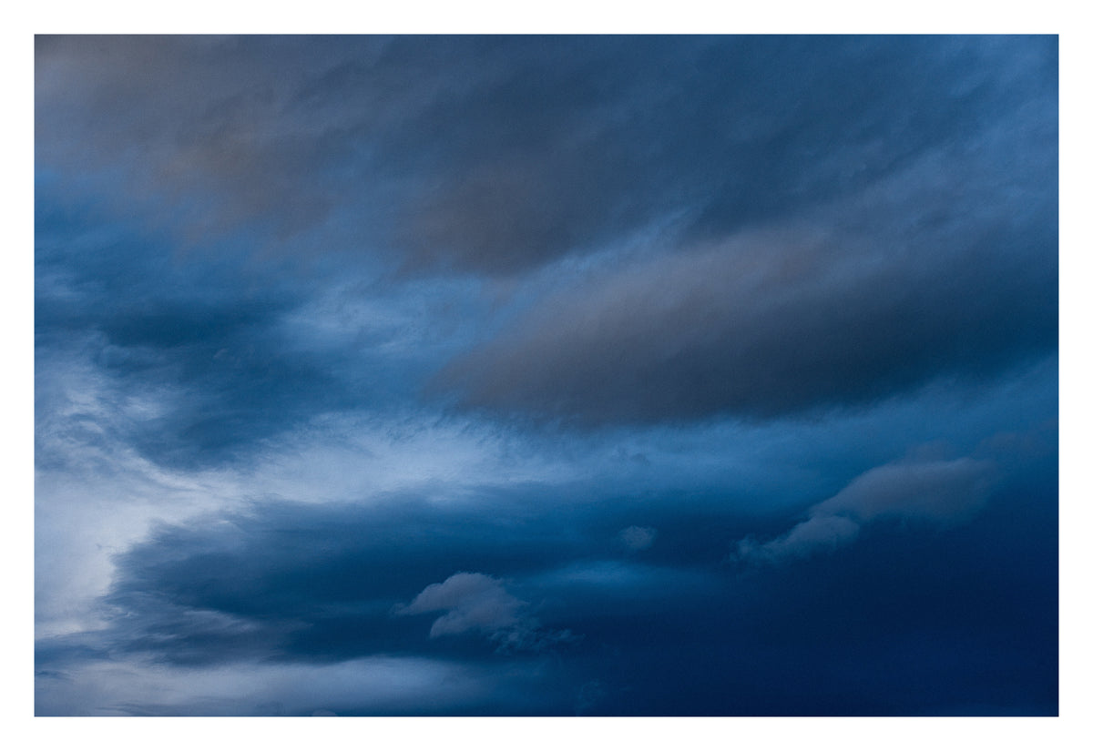 An Alberta sky in motion: colour, rhythm and light. Shown with the white signing border.